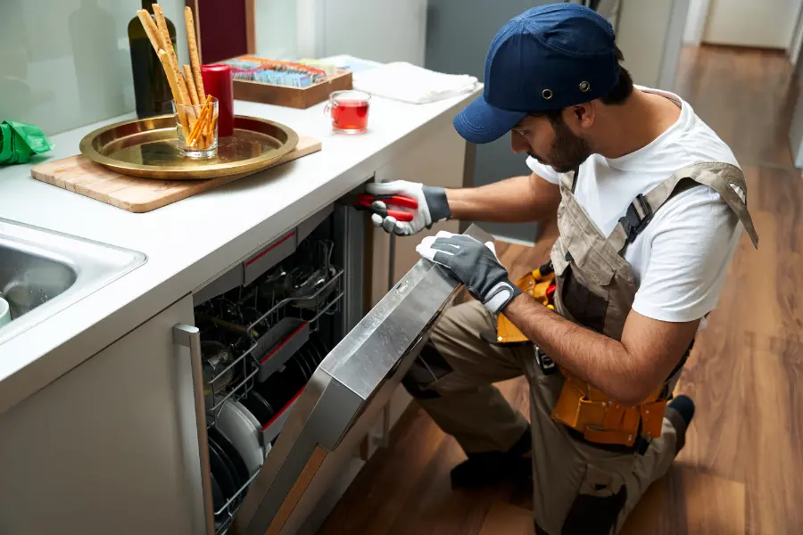 Young repairman by fixit appliance repair sharjah